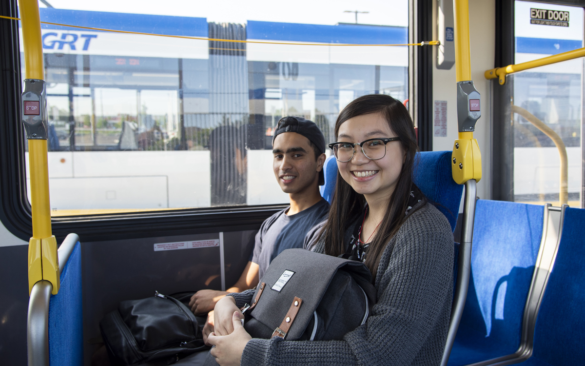 Two people ride the ION