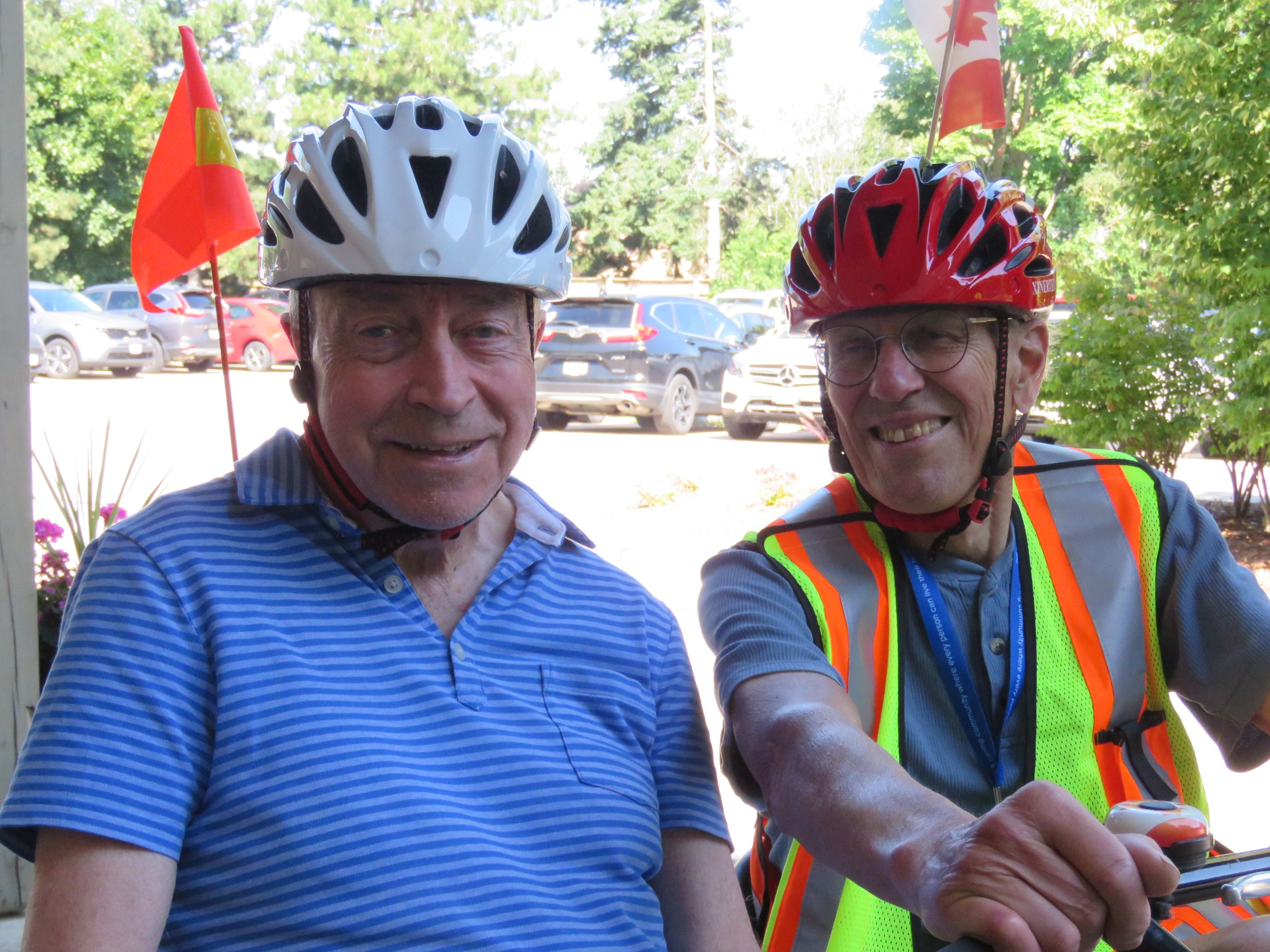 Two day program participants wear helmets on a bike ride