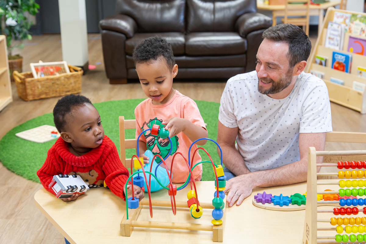 Man playing with kids