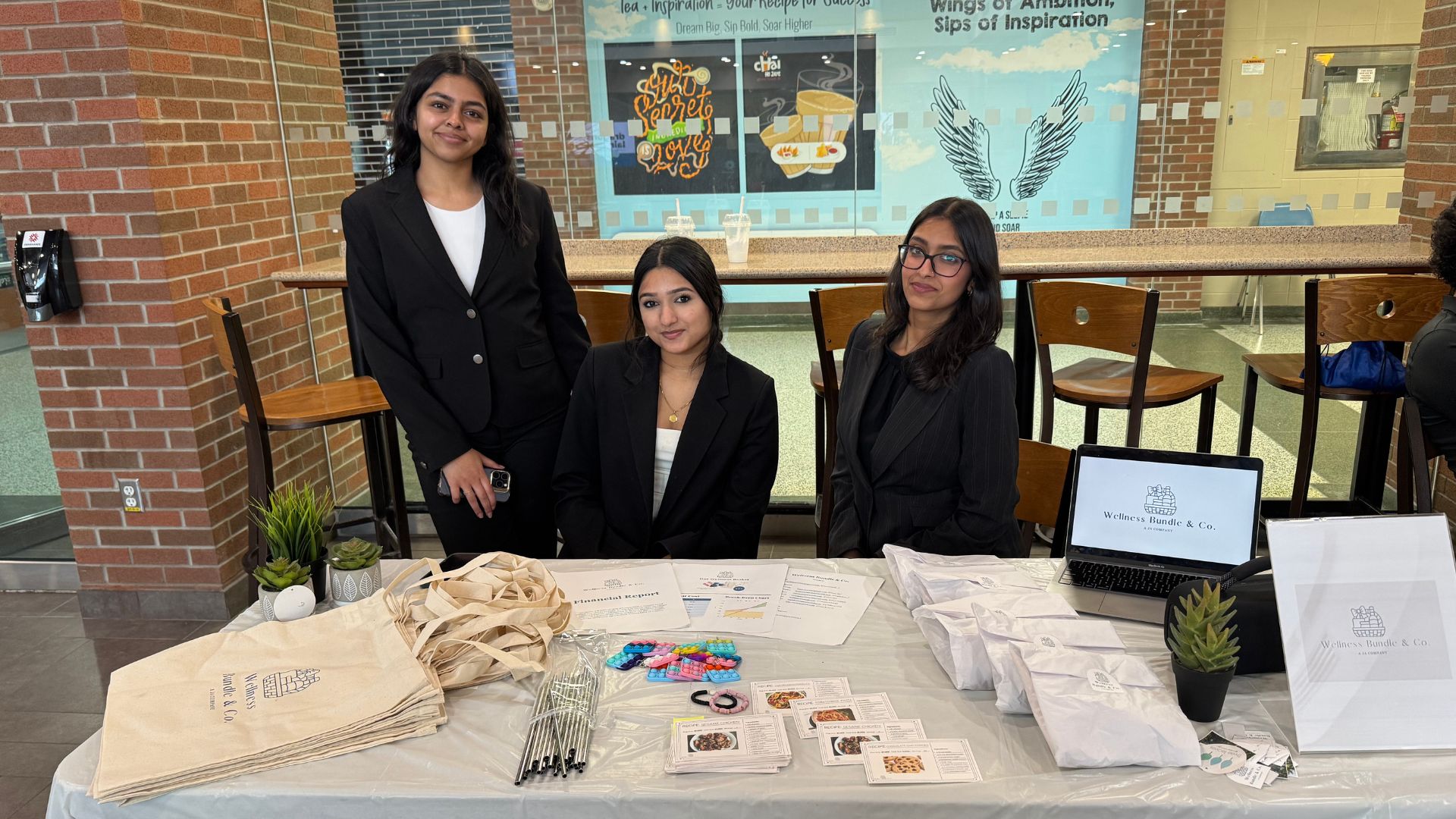 Wellness Bundle & Co., one of our Waterloo Region student companies, at our annual Dragons’ Lair Pitch Competition and showcasing their product bundle.