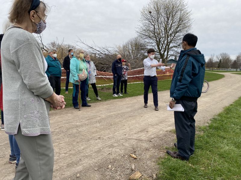 A group of people gathered in Montgomery Park