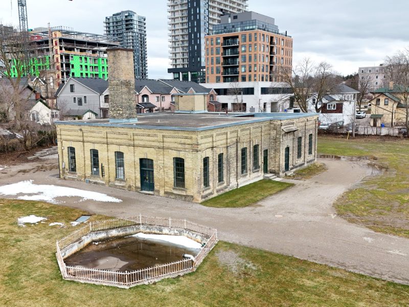 Exterior of the pump station, including pond at the back. 