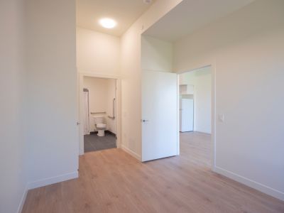 photo of bedroom looking toward ensuite washroom and bedroom door