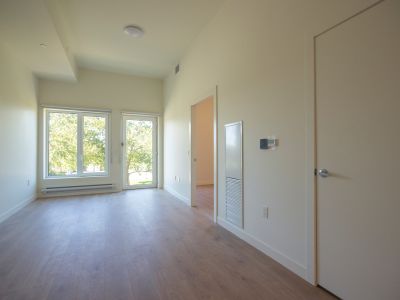 Photo of the dining room and living room of a standard unit at 82 wilson